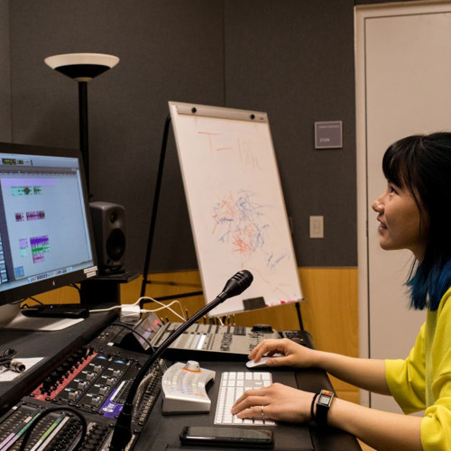 Student in editing room in the JHU-MICA Film Centre