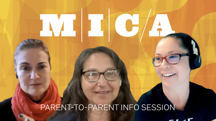 Three people looking in front of a orange MICA background