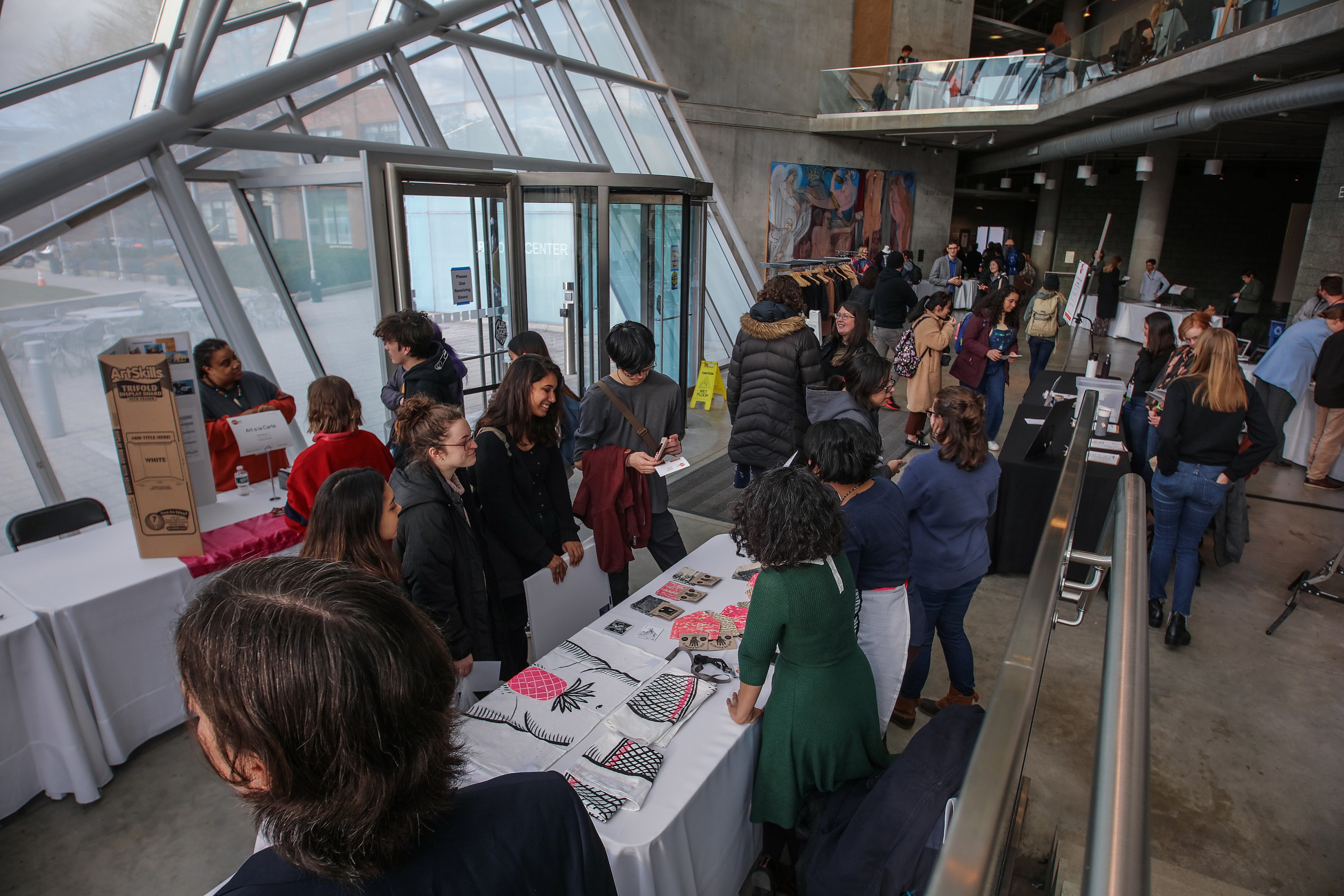 Event goers check out ventures at the fifth-annual pop-up-and-pitch event for MICA's UP/Start Venture Competition.